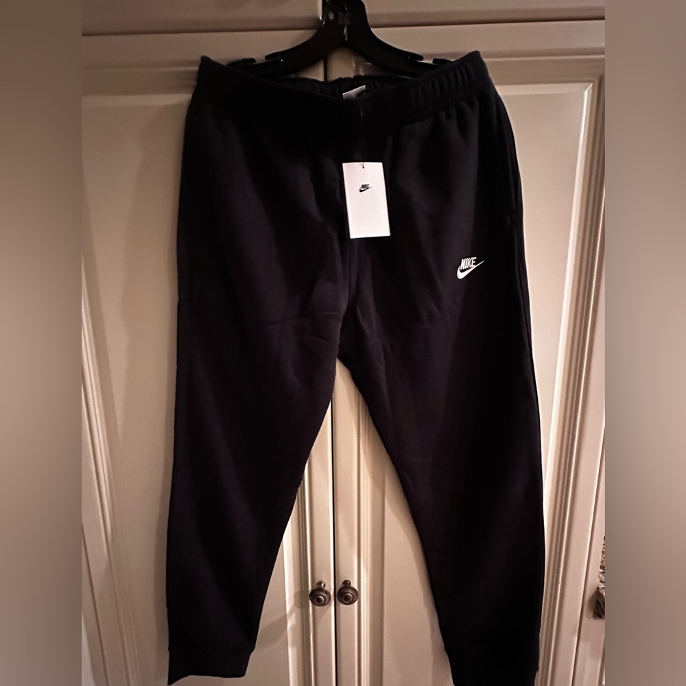 Nike Kids Black Joggers with White Swoosh
